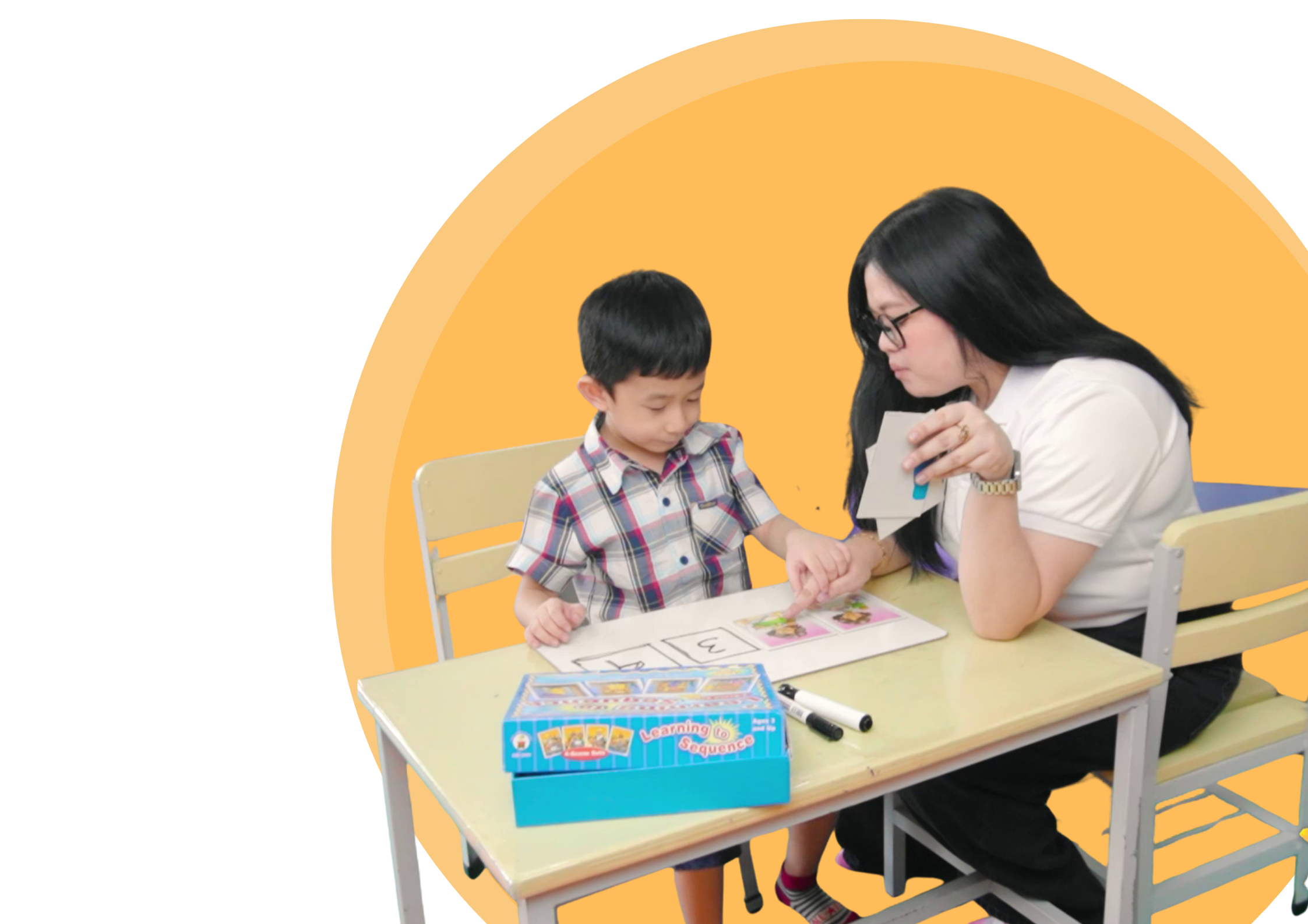 Child learning with therapist